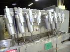 Used Filamatic (National Instruments) 8 Head In-Line Piston Filler, Model CVK-120. (8) 3/8’’ diameter nozzles with centering bells, mounted on a 31