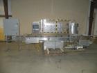 Used Filamatic (National Instruments) 12 Head In-Line Piston Filler. (12) 3/8’’ diameter nozzles with (9) centering bells, bottom up fill. (12) approximate 520cc pistons. Star wheel container indexin...