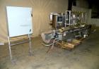 Used Filamatic (National Instruments) 12 Head In-Line Piston Filler. (12) 3/8’’ diameter nozzles with (9) centering bells, bottom up fill. (12) approximate 520cc pistons. Star wheel container indexin...