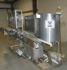 Used Filamatic (National Instruments) 12 Head In-Line Piston Filler. (12) 3/8’’ diameter nozzles with (9) centering bells, bottom up fill. (12) approximate 520cc pistons. Star wheel container indexin...