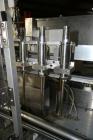 Used Cozzoli Model LF840-8 Inline Continuous Motion Walking Beam Style Piston Filler. Machine is capable of speeds from 40 to 120 containers per minute. Has integrated air cleaner. Container size ran...