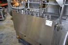 Used Cozzoli Model LF840-8 Inline Continuous Motion Walking Beam Style Piston Filler. Machine is capable of speeds from 40 to 120 containers per minute. Has integrated air cleaner. Container size ran...