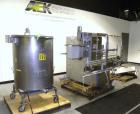 Used Filamatic (National Instruments) 10 Head In-Line Piston Filler, Model AL-800HS. No nozzles or centering bells, bottom up fill. (10) approximate 260cc pistons. Conveyor infeed and discharge. Incl...