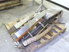 Used Filamatic (National Instruments) 10 Head In-Line Piston Filler, Model AL-800HS. No nozzles or centering bells, bottom up fill. (10) approximate 260cc pistons. Conveyor infeed and discharge. Incl...