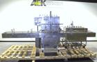 Used Filamatic Inline Piston Filler, Model CVK-300-1. Equipped with (8) 1000 cc pistons, all stainless steel. Automatic diving nozzle style, missing nozzles. Pneumatic container indexing. Self-contai...