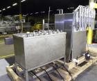 Used Filamatic Inline Piston Filler, Model CVK-300-1. Equipped with (8) 1000 cc pistons, all stainless steel. Automatic diving nozzle style, missing nozzles. Pneumatic container indexing. Self-contai...