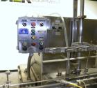 Used Filamatic Inline Piston Filler, Model CVK-300-1. Equipped with (8) 1000 cc pistons, all stainless steel. Automatic diving nozzle style, missing nozzles. Pneumatic container indexing. Self-contai...