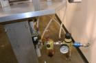 Used Hinds-Bock Single Piston Filler/Depositer, Model SP-64, Stainless Steel. Capable of speeds from 10 to 20 containers per minute (depending on fill size). Fill size range: 1/2 oz to 64 oz with cha...