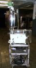 Used Kalix Single Head Piston Filler, Model 50MI, Stainless Steel. Single piston filling head, jacketed and agitated feed hopper, and foot pedal control. Mounted on a stand.