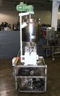 Used Kalix Single Head Piston Filler, Model 50MI, Stainless Steel. Single piston filling head, jacketed and agitated feed hopper, and foot pedal control. Mounted on a stand.