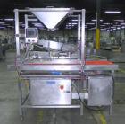 Used Quantum Model QTIA2000-12 Dual Lane Sauce Applicator. Twin piston design is rated at up to 120 pies per minute.  Machine has Allen Bradley controls.  Has continuous motion conveyors, sanitary de...