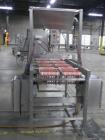 Used Quantum Model QTIA2000-12 Dual Lane Sauce Applicator. Twin piston design is rated at up to 120 pies per minute.  Machine has Allen Bradley controls.  Has continuous motion conveyors, sanitary de...