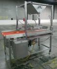 Used Quantum Model QTIA2000-12 Dual Lane Sauce Applicator. Twin piston design is rated at up to 120 pies per minute.  Machine has Allen Bradley controls.  Has continuous motion conveyors, sanitary de...