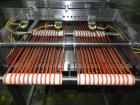 Used Quantum Model QTIA2000-12 Dual Lane Sauce Applicator. Twin piston design is rated at up to 120 pies per minute.  Machine has Allen Bradley controls.  Has continuous motion conveyors, sanitary de...