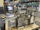Used REB, Inc Automatic Inline Piston Filler, Model IVS. Current set up has 6 pistons with 6-diving fill nozzles. Is rated for speeds from 10 to 120 containers per minute (depending on container size...
