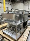 Used REB, Inc Automatic Inline Piston Filler, Model IVS. Current set up has 6 pistons with 6-diving fill nozzles. Is rated for speeds from 10 to 120 containers per minute (depending on container size...