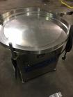 Used Simplex Model AS200 Twin Piston Filler and Accumulation Tables.