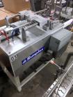 Used- Simplex Model AS200 Twin Piston Filler and Accumulation Tables.