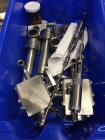 Used Simplex Model AS200 Twin Piston Filler and Accumulation Tables.
