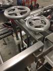 Used Simplex Model AS200 Twin Piston Filler and Accumulation Tables.