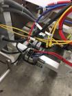 Used Simplex Model AS200 Twin Piston Filler and Accumulation Tables.