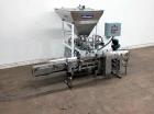 Used Simplex Model AS200, twin piston filler, rated from 5 to 15 cycles per minute – speeds dependent on materials, application and machine configuration. Fill range: up to 8.9 oz . Equipped with 4-1...