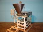 Used Simplex 4 Head Filler. Stainless steel nozzles 2