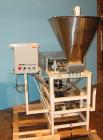 Used Simplex 4 Head Filler. Stainless steel nozzles 2