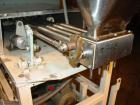 Used Simplex 4 Head Filler. Stainless steel nozzles 2