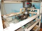 Used Simplex 4 Head Filler. Stainless steel nozzles 2
