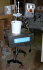 Used Technogel Ice Cream Doser Filling Machine, model Doser Desk, 304 stainless steel. Designed to fill containers of different shapes and sizes. The doser is the rotating spool type. 1.5 kw, 1/60/22...