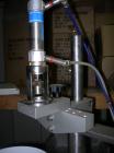 Used Technogel Ice Cream Doser Filling Machine, model Doser Desk, 304 stainless steel. Designed to fill containers of different shapes and sizes. The doser is the rotating spool type. 1.5 kw, 1/60/22...