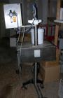 Used Technogel Ice Cream Doser Filling Machine, model Doser Desk, 304 stainless steel. Designed to fill containers of different shapes and sizes. The doser is the rotating spool type. 1.5 kw, 1/60/22...
