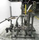 Used Thiele Model AF-2T-B1 Two Head PD Filler. Filler is designed to fill Quart to Gallon containers, (actual range 4 oz min to 185 oz maximum) at rates of 30-400 quart/min & 20-30 gallon/min. Each f...