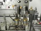 Used Thiele Model AF-2T-B1 Two Head PD Filler. Filler is designed to fill Quart to Gallon containers, (actual range 4 oz min to 185 oz maximum) at rates of 30-400 quart/min & 20-30 gallon/min. Each f...