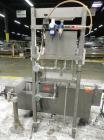 Used Thiele Model AF-2T-B1 Two Head PD Filler. Filler is designed to fill Quart to Gallon containers, (actual range 4 oz min to 185 oz maximum) at rates of 30-400 quart/min & 20-30 gallon/min. Each f...