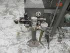 Used Thiele Model AF-2T-B1 Two Head PD Filler. Filler is designed to fill Quart to Gallon containers, (actual range 4 oz min to 185 oz maximum) at rates of 30-400 quart/min & 20-30 gallon/min. Each f...