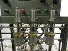Used Thiele Model AF-3T-B1 Three Head PD Filler. Filler is designed to fill Quart to Gallon containers, (actual range 4 oz min to 185 oz maximum) at rates of 45 - 60 quart/min & 30-45 gallon/min. Eac...
