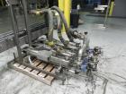 Used Thiele Model AF-3T-B1 Three Head PD Filler. Filler is designed to fill Quart to Gallon containers, (actual range 4 oz min to 185 oz maximum) at rates of 45 - 60 quart/min & 30-45 gallon/min. Eac...