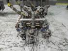 Used Thiele Model AF-3T-B1 Three Head PD Filler. Filler is designed to fill Quart to Gallon containers, (actual range 4 oz min to 185 oz maximum) at rates of 45 - 60 quart/min & 30-45 gallon/min. Eac...