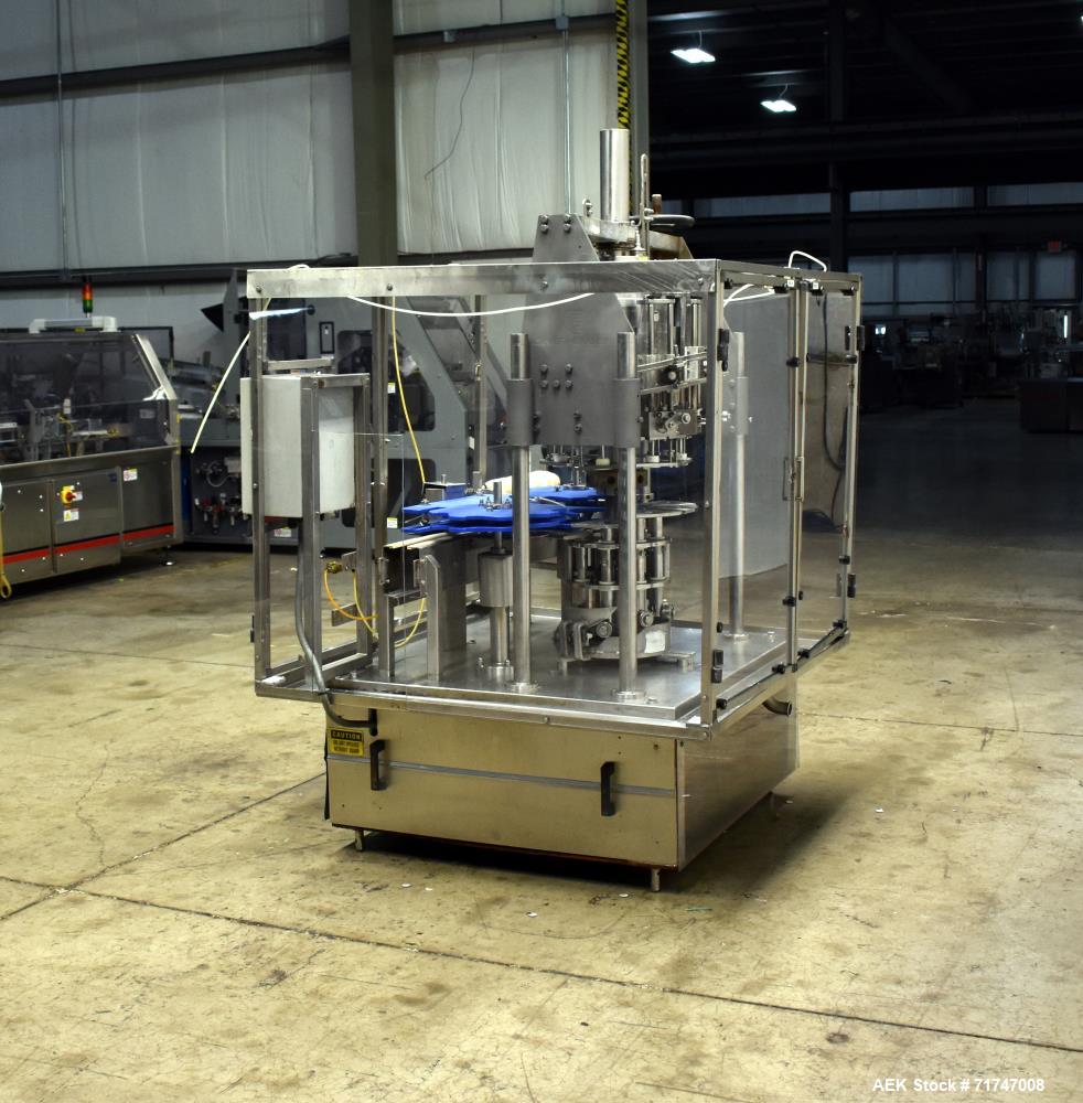 Used- Biner Ellison 8-Head Rotary Piston Filler