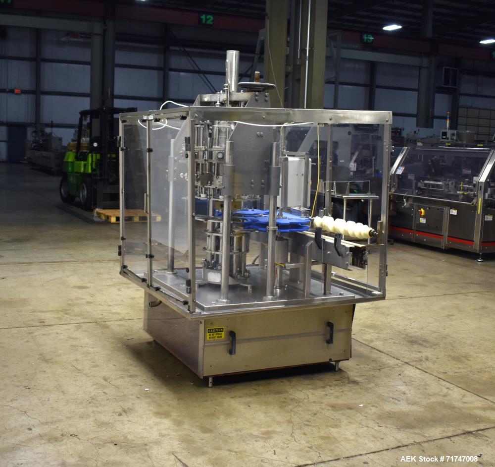 Used Biner Ellison 8-Head Rotary Piston Filler
