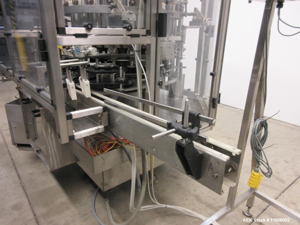 Used Consolidated Model RP221 21 Head Rotary Stainless Steel Piston Filler
