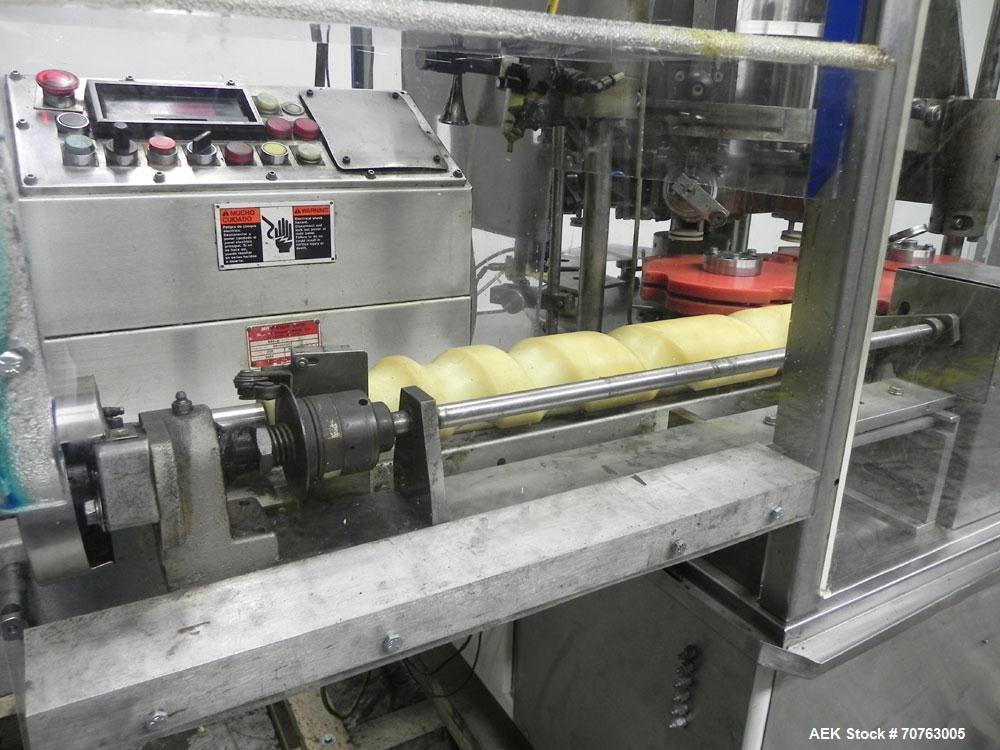 Used MRM Elgin Model RPF-8 Rotary Piston Filler