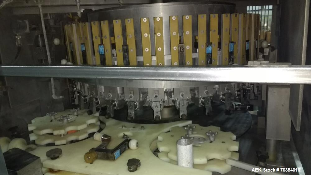 Used MRM 30 Piston Filler. Last running pie dough in a can. 2" piston with 7" stroke - 12oz capacity. Infeed screw with infeed/discharge star. 4.75" centers. No container no fill , electric fill adju...