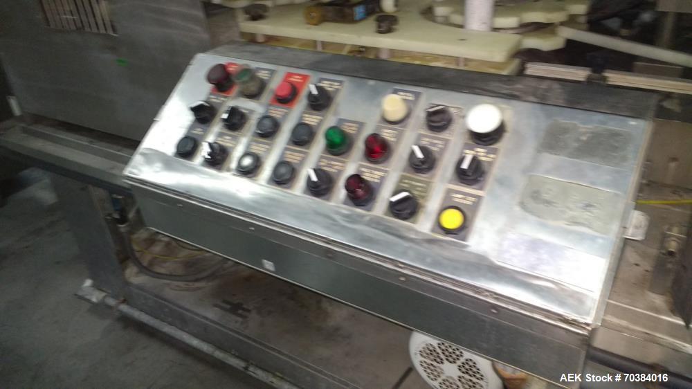 Used MRM 30 Piston Filler. Last running pie dough in a can. 2" piston with 7" stroke - 12oz capacity. Infeed screw with infeed/discharge star. 4.75" centers. No container no fill , electric fill adju...
