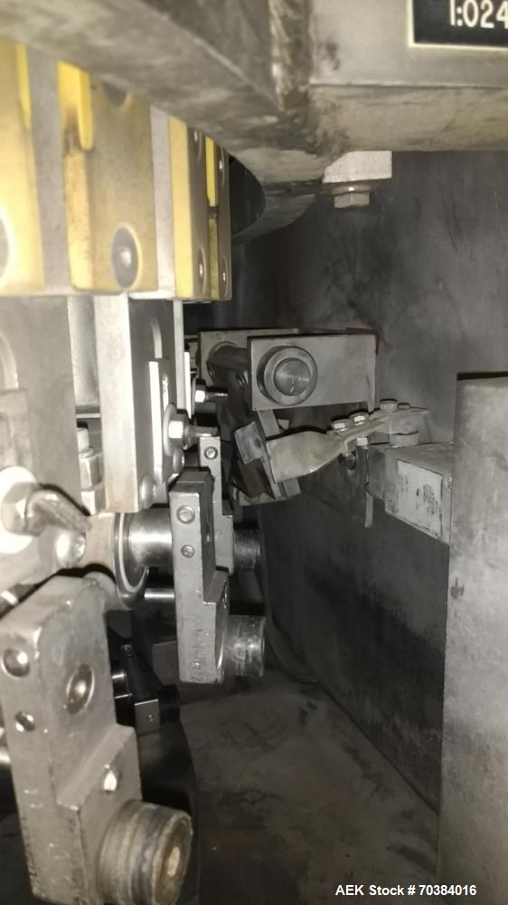 Used MRM 30 Piston Filler. Last running pie dough in a can. 2" piston with 7" stroke - 12oz capacity. Infeed screw with infeed/discharge star. 4.75" centers. No container no fill , electric fill adju...