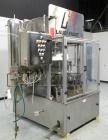 Used- Laub Hunt Posifiller 16 Head Rotary Piston Filler