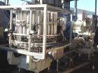 Used Pfaudler 28 Head Rotary Piston Filler.