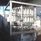Used- Pfaudler 28 Head Rotary Piston Filler.